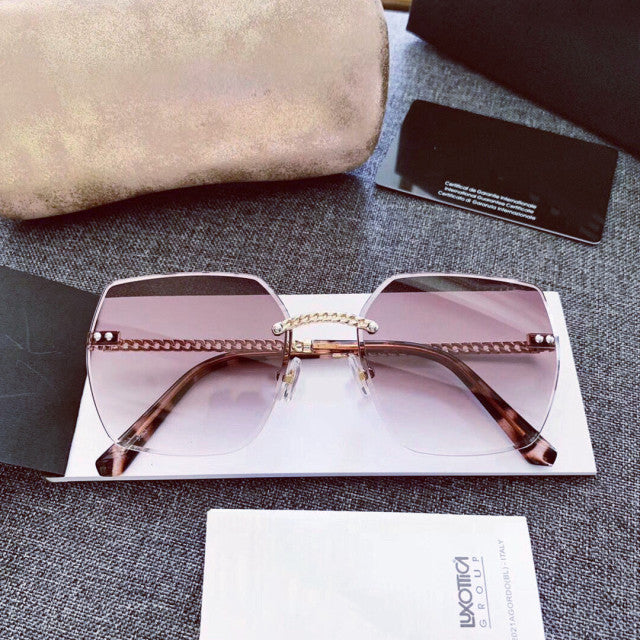 2021   Luxury  Designer Fashion Oval Rimless SunglassesSummer Glasses Fashion Sun glasses For Men Women UV400 Sunglasses